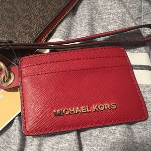 Brand new Michael kors wristlet / card holder with tag